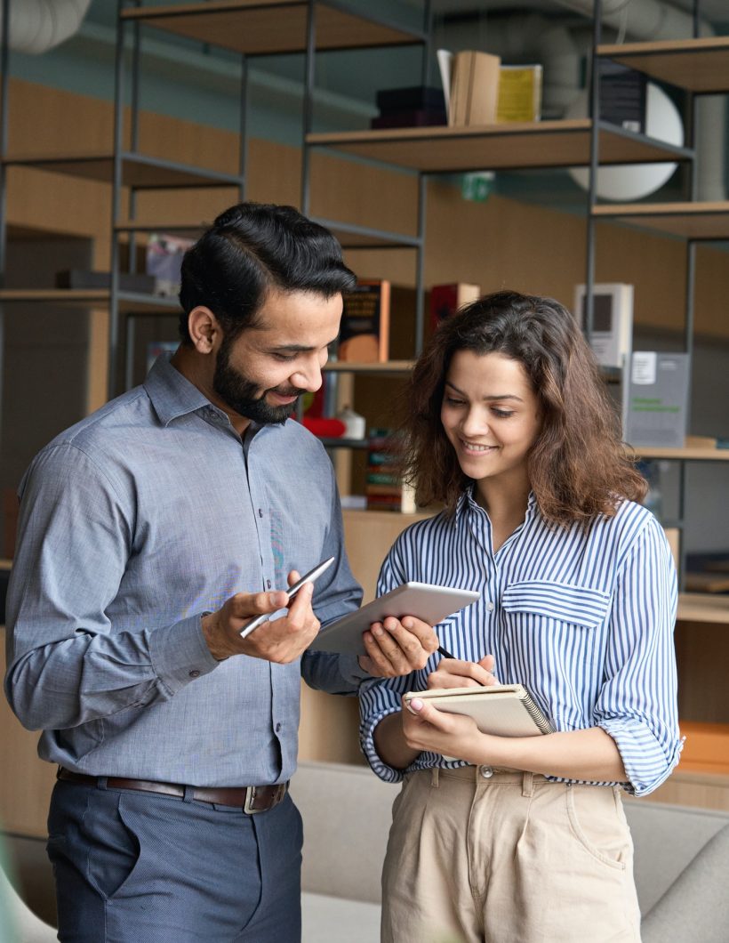 diverse-friendly-coworkers-talking-using-digital-tablet-in-office-.jpg diverse-friendly-coworkers-talking-using-digital-tablet-in-office-.jpg